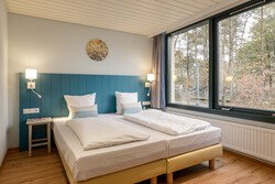 Schlafzimmer eines Premium-Bungalows